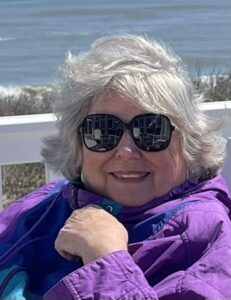 Nancy Meadows Taylor -AWS, NWS wearing sunglasses